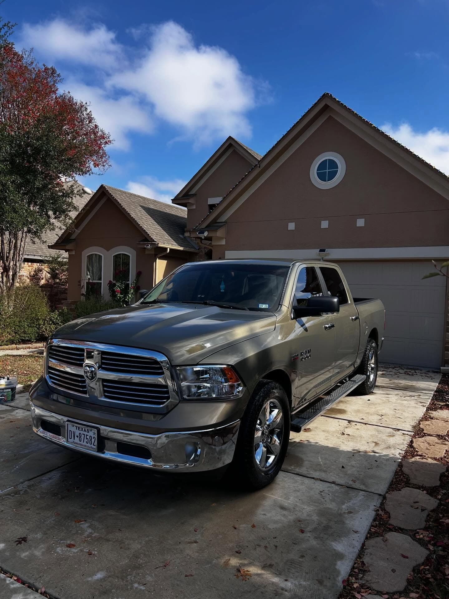 Ram 1500 freshly detailed in a residential driveway