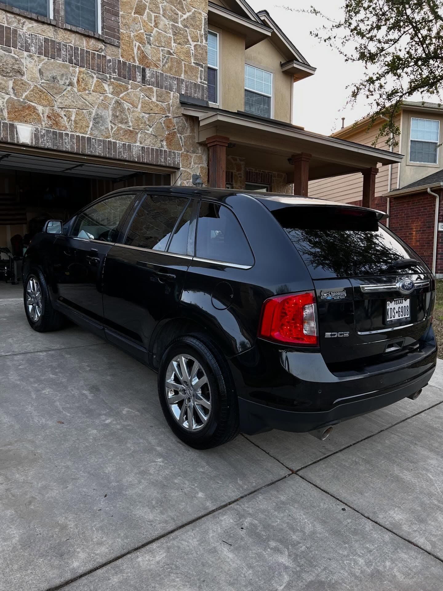 Black Ford Edge wheels and tire finish
